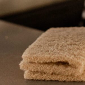 Tampon à récurer en coquille de noix